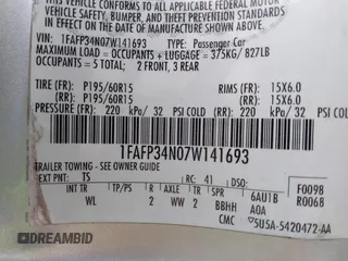 2007 Ford Focus S with VIN 1FAFP34N07W141693, listed as a IAAI auction lot 42310938 with 150,489 mi miles and . Bid and sale history available at DreamBid. Image 9.