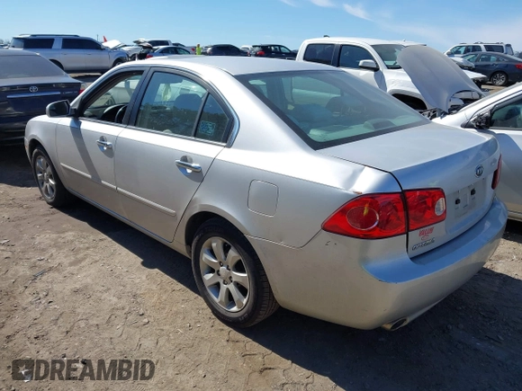 2007 Kia Optima EX with VIN KNAGE124975157963, listed as a IAAI auction lot 41673886 with 128,278 mi miles. Bid and sale history available at carsss.com. Image 3.