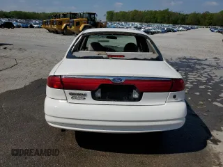 1999 Ford Contour SE z VIN 1FAFP6638XK129022, wystawiony jako Copart lot #52625705 z przebiegiem 86 383 mil mil oraz Szkody całkowita. Historia ofert i sprzedaży dostępna na DreamBid. Obrazek 6.