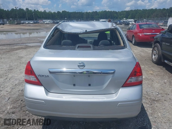2011 Nissan Versa S with VIN 3N1BC1AP4BL446596, listed as a IAAI auction lot 42425302 with 141,047 mi miles and . Bid and sale history available at DreamBid. Image 16.