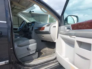 2010 Chrysler Town & Country Touring with VIN 2A4RR5DX5AR329523, listed as a IAAI auction lot 41941874 with 207,079 mi miles. Bid and sale history available at carsss.com. Image 5.