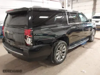 2017 Chevrolet Suburban Premier with VIN 1GNSKJKC3HR260195, listed as a IAAI auction lot 41609363 with 166,447 mi miles. Bid and sale history available at carsss.com. Image 4.