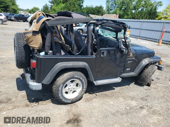 2002 Jeep Wrangler Sport with VIN 1J4FA49S02P721457, listed as a Copart auction lot 61726855 with 76,191 mi miles and Salvage title. Bid and sale history available at DreamBid. Image 3.