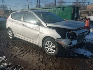 2014 Hyundai Accent GS with VIN KMHCT5AEXEU167098, listed as a IAAI auction lot 41552742 with 48,645 mi miles. Bid and sale history available at carsss.com. Image 1.