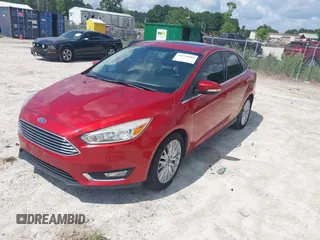 2018 Ford Focus Titanium z VIN 1FADP3J23JL295888, wystawiony jako IAAI lot #42524088 z przebiegiem 108 812 mil mil oraz . Historia ofert i sprzedaży dostępna na DreamBid. Obrazek 19.