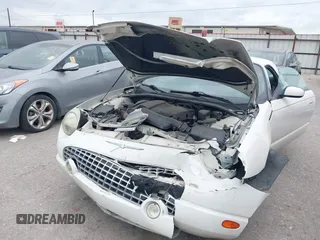 2002 Ford Thunderbird w/Hardtop Premium with VIN 1FAHP60A62Y127579, listed as a IAAI auction lot 42035019 with 98,582 mi miles. Bid and sale history available at carsss.com. Image 6.
