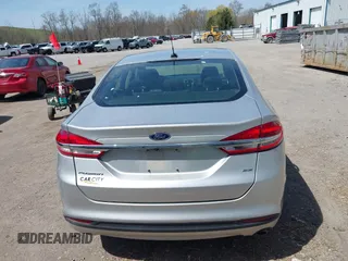 2018 Ford Fusion SE z VIN 3FA6P0H77JR226390, wystawiony jako IAAI lot #42120981 z przebiegiem 114 057 mil mil oraz . Historia ofert i sprzedaży dostępna na DreamBid. Obrazek 17.