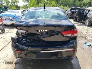 2022 Kia Rio S with VIN 3KPA24AD2NE463067, listed as a Copart auction lot 57944294 with 77,382 mi miles and Non Repairable. Bid and sale history available at DreamBid. Image 6.