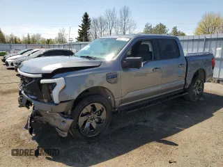 2024 Ford F-150 Lightning Flash z VIN 1FT6W3L74RWG04714, wystawiony jako Copart lot #56320265 z przebiegiem 13 454 mil mil oraz Szkoda całkowita • Salvage title. Historia ofert i sprzedaży dostępna na DreamBid. Obrazek 1.