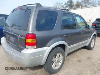 2005 Ford Escape Hybrid with VIN 1FMCU96H55KC23712, listed as a IAAI auction lot 41709080 with 164,281 mi miles and . Bid and sale history available at DreamBid. Image 4.