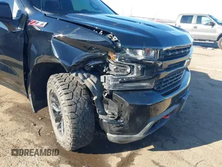2021 Chevrolet Silverado 1500 LT Trail Boss with VIN 1GCPYFEL8MZ254411, listed as a IAAI auction lot 41313530 with 32,409 mi miles and . Bid and sale history available at DreamBid. Image 6.