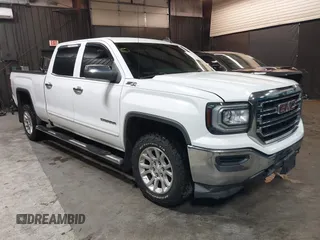 2018 GMC Sierra 1500 SLE z VIN 3GTU2MEC5JG104843, wystawiony jako IAAI lot #42447744 z przebiegiem 136 874 mil mil oraz . Historia ofert i sprzedaży dostępna na DreamBid. Obrazek 1.