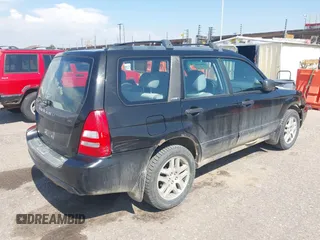 2003 Subaru Forester XS with VIN JF1SG65633H730386, listed as a IAAI auction lot 42084706 with 199,602 mi miles. Bid and sale history available at carsss.com. Image 4.
