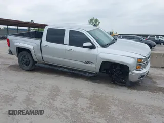 2015 Chevrolet Silverado 1500 LT with VIN 3GCUKREC8FG490856, listed as a IAAI auction lot 42067589 with 121,120 mi miles. Bid and sale history available at carsss.com. Image 13.