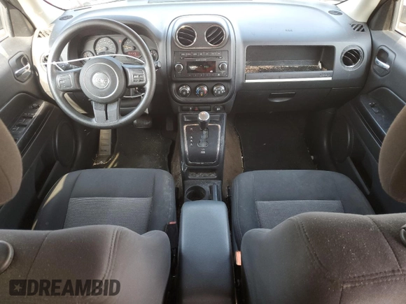 2014 Jeep Patriot Sport with VIN 1C4NJPBA7ED812056, listed as a Copart auction lot 60888345 with 113,243 mi miles and Salvage title. Bid and sale history available at DreamBid. Image 8.