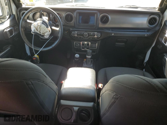 2022 Jeep Wrangler Unlimited High Tide with VIN 1C4HJXDG9NW132131, listed as a Copart auction lot 69314354 with 33,711 mi miles and Salvage Title. Bid and sale history available at DreamBid. Image 8.
