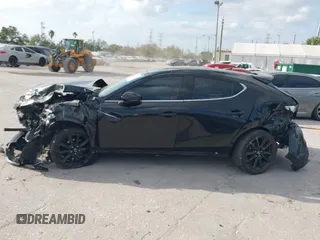 2023 Mazda 3 Premium Plus z VIN JM1BPBNY0P1615814, wystawiony jako IAAI lot #41718577 z przebiegiem Nie podano mil oraz . Historia ofert i sprzedaży dostępna na DreamBid. Obrazek 14.