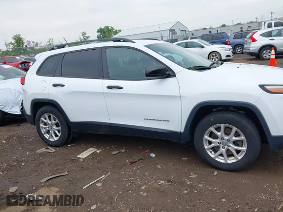 2016 Jeep Cherokee Sport z VIN 1C4PJMAS5GW268097, wystawiony jako IAAI lot #42211745 z przebiegiem 101 496 mil mil oraz . Historia ofert i sprzedaży dostępna na DreamBid. Obrazek 13.