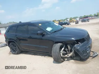 2017 Jeep Grand Cherokee Laredo with VIN 1C4RJFAGXHC818834, listed as a IAAI auction lot 42422744 with 154,287 mi miles and . Bid and sale history available at DreamBid. Image 13.