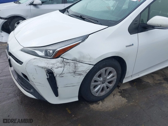 2021 Toyota Prius L Eco with VIN JTDKAMFU6M3141019, listed as a IAAI auction lot 41821212 with 202,756 mi miles. Bid and sale history available at carsss.com. Image 6.