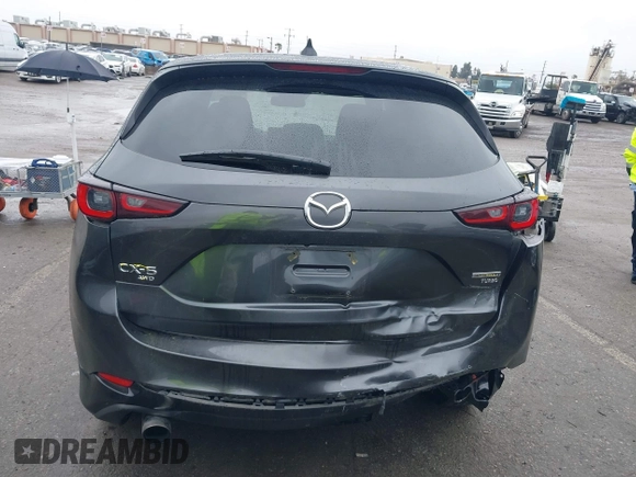 2022 Mazda CX-5 2.5 Turbo with VIN JM3KFBAY8N0647204, listed as a IAAI auction lot 41567490 with 40,396 mi miles and . Bid and sale history available at carsss.com. Image 16.