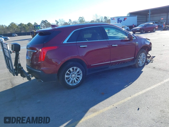 2018 Cadillac XT5 FWD with VIN 1GYKNARS4JZ211455, listed as a IAAI auction lot 41257536 with 102,032 mi miles and . Bid and sale history available at DreamBid. Image 4.