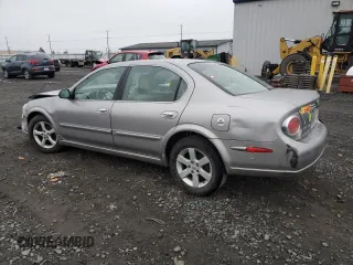 2002 Nissan Maxima GXE с VIN JN1DA31D12T414295, выставлен на аукционе Copart как лот 83090944 с пробегом 175 456 миль миль и Списание • Salvage title. История ставок и продаж доступна на DreamBid. Изображение 2.