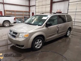 2009 Dodge Grand Caravan SXT z VIN 2D8HN541X9R652097, wystawiony jako IAAI lot #42370946 z przebiegiem 189 911 mil mil oraz . Historia ofert i sprzedaży dostępna na DreamBid. Obrazek 2.