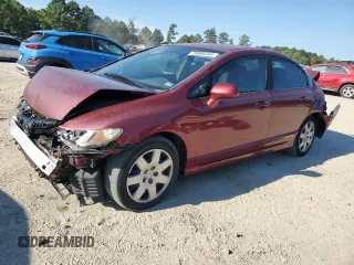 2011 Honda Civic LX with VIN 19XFA1F54BE001632, listed as a Copart auction lot 70900264 with 209,840 mi miles and Salvage Title. Bid and sale history available at DreamBid. Image 1.