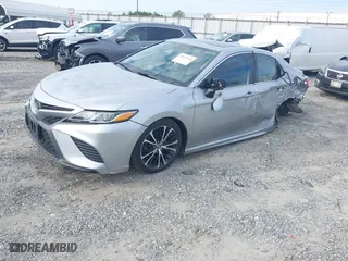 2020 Toyota Camry SE with VIN 4T1J11AKXLU879877, listed as a IAAI auction lot 40827028 with 176,872 mi miles. Bid and sale history available at carsss.com. Image 18.