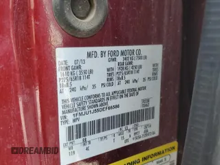 2013 Ford Expedition XLT with VIN 1FMJU1J55DEF66586, listed as a Copart auction lot 58336545 with 175,228 mi miles and Salvage title. Bid and sale history available at DreamBid. Image 13.