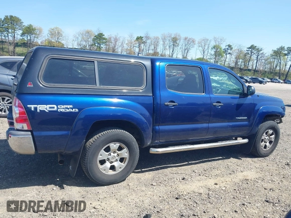2014 Toyota Tacoma with VIN 3TMLU4EN4EM154261, listed as a IAAI auction lot 42119237 with 211,929 mi miles and . Bid and sale history available at DreamBid. Image 14.