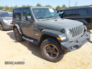 2020 Jeep Wrangler Sport S с VIN 1C4GJXAN5LW146068, выставлен на аукционе IAAI как лот 42071619 с пробегом 51 238 миль миль и . История ставок и продаж доступна на DreamBid. Изображение 1.