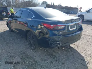 2016 Mazda 6 i Grand Touring with VIN JM1GJ1W50G1478699, listed as a IAAI auction lot 41711211 with 208,720 mi miles and . Bid and sale history available at DreamBid. Image 21.