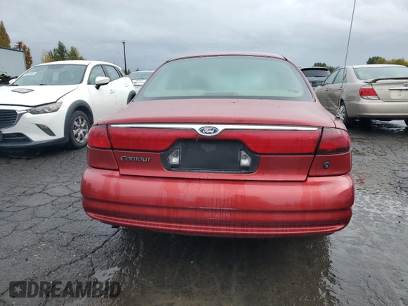 2000 Ford Contour SE Fleet z VIN 1FAFP6636YK142708, wystawiony jako Copart lot #77976124 z przebiegiem 126 879 mil mil oraz Szkody całkowita. Historia ofert i sprzedaży dostępna na DreamBid. Obrazek 6.
