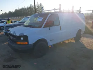 2006 Chevrolet Express Cargo Van with VIN 1GCGG25V061137999, listed as a IAAI auction lot 41451436 with 147,540 mi miles. Bid and sale history available at carsss.com. Image 2.