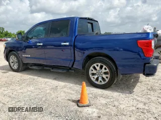 2021 Nissan Titan SV with VIN 1N6AA1EF0MN512559, listed as a Copart auction lot 61561305 with 31,344 mi miles and Salvage title. Bid and sale history available at DreamBid. Image 2.