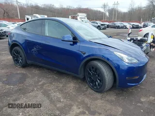 2023 Tesla Model Y Long Range with VIN 7SAYGDEE4PF891709, listed as a IAAI auction lot 41944893 with 15,864 mi miles. Bid and sale history available at carsss.com. Image 1.