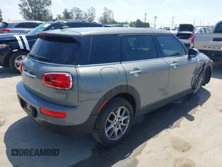 2019 MINI Clubman Cooper with VIN WMWLN5C57K2E34894, listed as a IAAI auction lot 42072962 with 49,274 mi miles and . Bid and sale history available at DreamBid. Image 4.