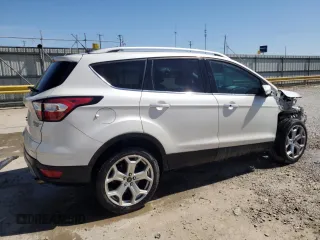 2017 Ford Escape Titanium with VIN 1FMCU9J96HUB65716, listed as a Copart auction lot 49584665 with 112,149 mi miles and Salvage Title. Bid and sale history available at carsss.com. Image 3.