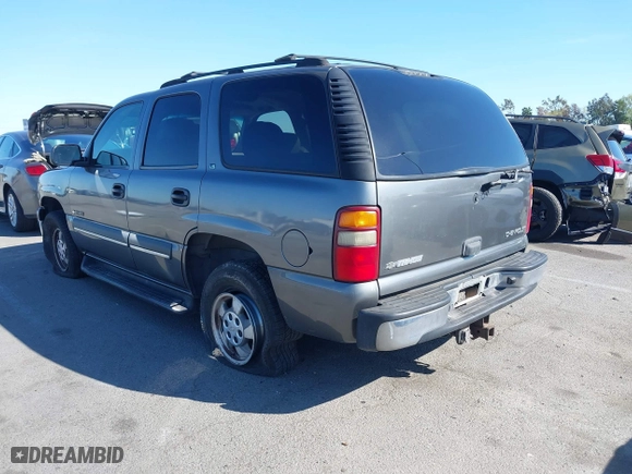 2002 Chevrolet Tahoe LT with VIN 1GNEC13ZX2R224413, listed as a IAAI auction lot 41818623 with 157,509 mi miles. Bid and sale history available at carsss.com. Image 3.