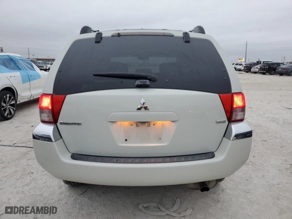 2004 Mitsubishi Endeavor XLS with VIN 4A4MM31S14E056988, listed as a Copart auction lot 84604114 with 153,434 mi miles and Salvage Title. Bid and sale history available at carsss.com. Image 6.