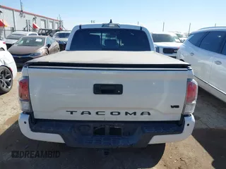 2023 Toyota Tacoma 4WD SR with VIN 3TMCZ5AN7PM653250, listed as a IAAI auction lot 41673534 with 19,496 mi miles. Bid and sale history available at carsss.com. Image 17.