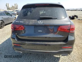 2021 Mercedes-Benz GLC 300 with VIN W1N0G8EB8MF872703, listed as a Copart auction lot 60322035 with 56,609 mi miles and Salvage title. Bid and sale history available at DreamBid. Image 6.