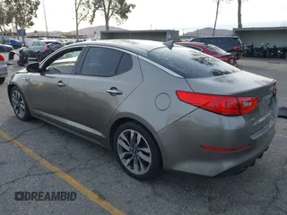 2014 Kia Optima SX Turbo with VIN 5XXGR4A63EG291596, listed as a IAAI auction lot 41385491 with 265,017 mi miles and . Bid and sale history available at DreamBid. Image 3.