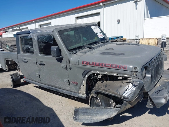 2023 Jeep Gladiator Rubicon with VIN 1C6JJTBG6PL538859, listed as a IAAI auction lot 42633055 with 22,899 mi miles and . Bid and sale history available at DreamBid. Image 14.