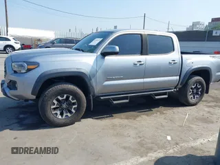 2020 Toyota Tacoma SR5 with VIN 3TMAZ5CN7LM138859, listed as a IAAI auction lot 42150725 with 36,462 mi miles and . Bid and sale history available at DreamBid. Image 14.