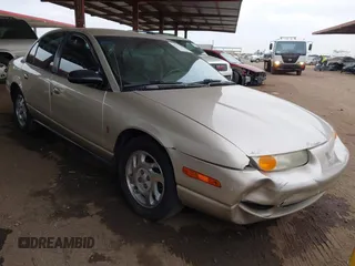 2001 Saturn SL z VIN 1G8ZJ54771Z315992, wystawiony jako IAAI lot #41571554 z przebiegiem 262 240 mil mil oraz . Historia ofert i sprzedaży dostępna na DreamBid. Obrazek 1.