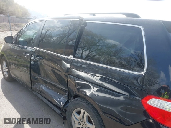 2007 Honda Odyssey EX-L with VIN 5FNRL38627B041332, listed as a IAAI auction lot 41934767 with 234,332 mi miles and . Bid and sale history available at carsss.com. Image 6.