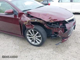 2014 Toyota Avalon Limited with VIN 4T1BK1EB5EU124568, listed as a IAAI auction lot 41996280 with 102,440 mi miles. Bid and sale history available at carsss.com. Image 6.